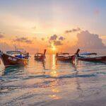 Longtail boats at sunset in Thailand